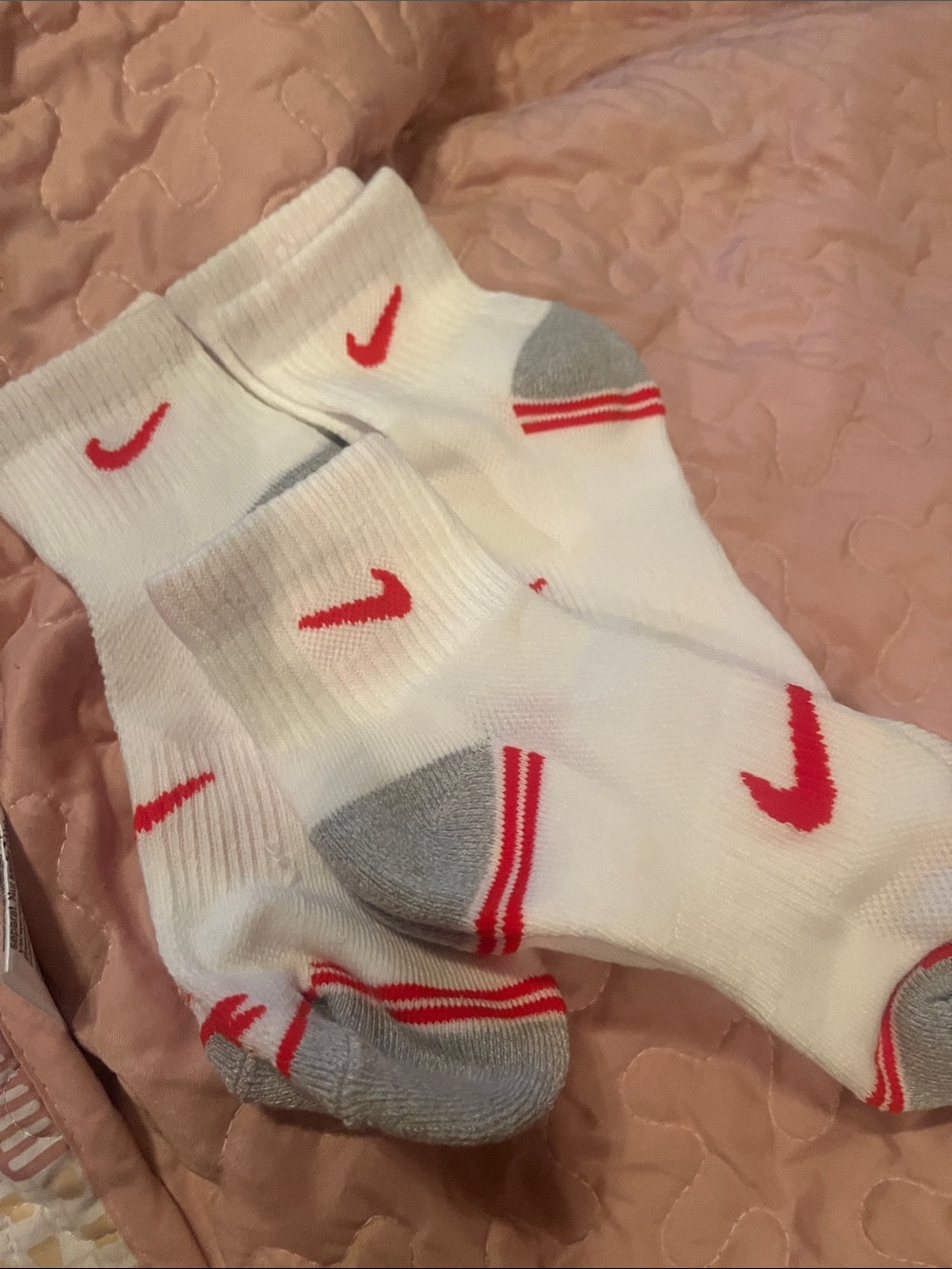 Nike White Crew Athletic Socks with Red Swoosh and Gray Accents